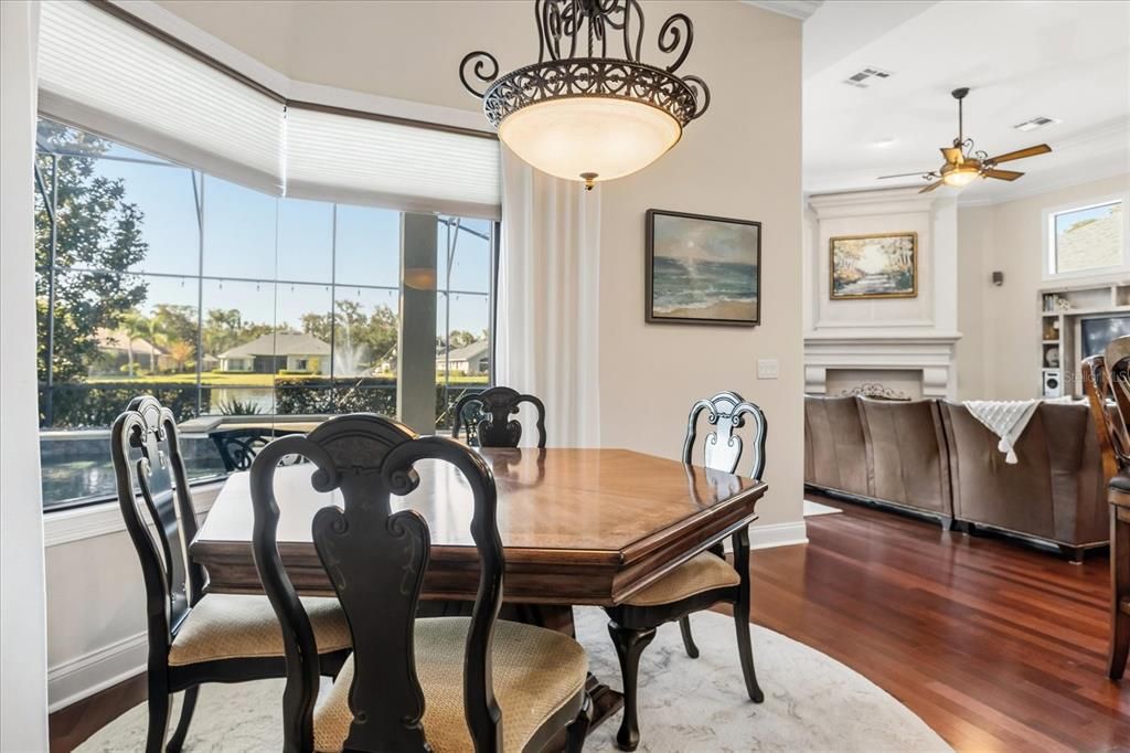 Dining room, Fireplace, Interior, Pendant Lights, Wood Texture Flooring