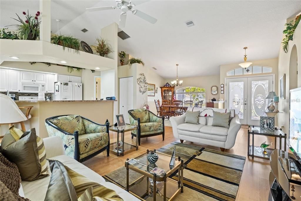 Chandelier, Dining room, Interior, Kitchen, Living room, Pendant Lights, Recessed Lighting, Wood Texture Flooring