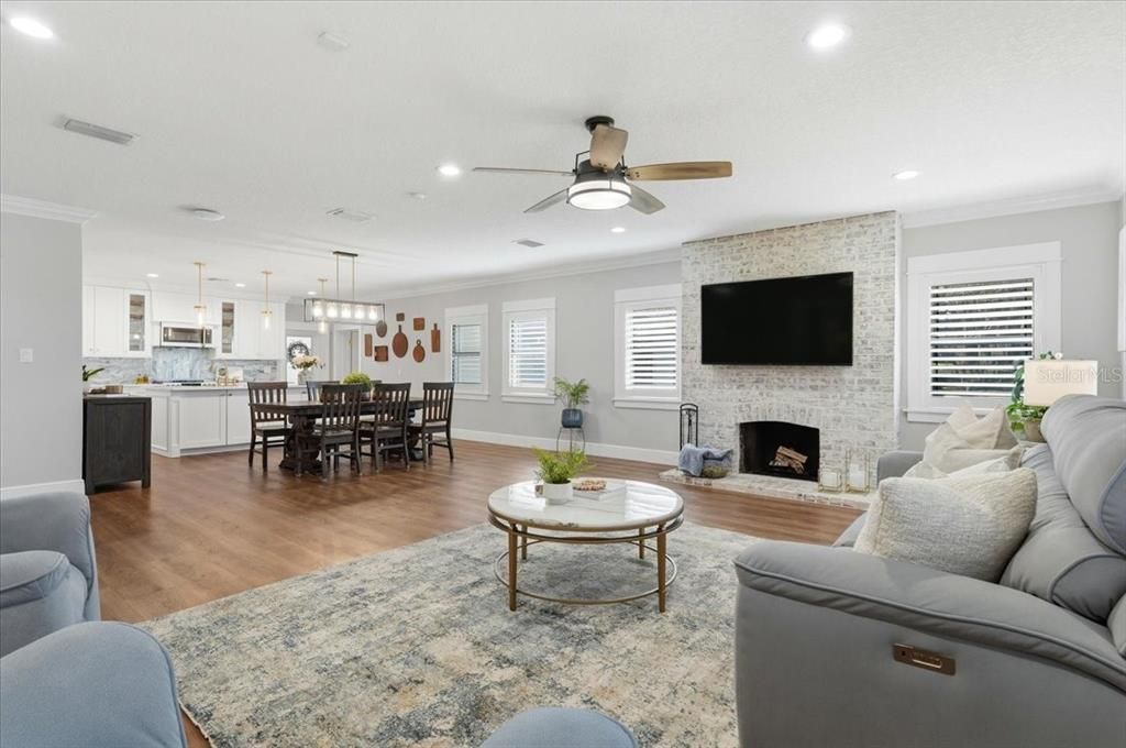 Dining room, Fireplace, Interior, Kitchen, Living room, Pendant Lights, Recessed Lighting, Stone Walls, Wood Texture Flooring