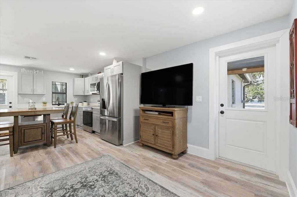 Dining room, Interior, Kitchen, Recessed Lighting, Stainless Steel Appliances, Wood Texture Flooring