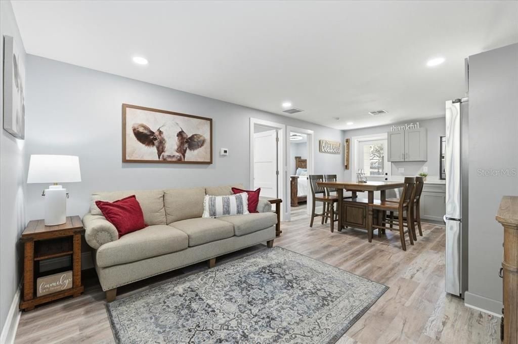 Dining room, Interior, Kitchen, Living room, Recessed Lighting, Stainless Steel Appliances, Wood Texture Flooring