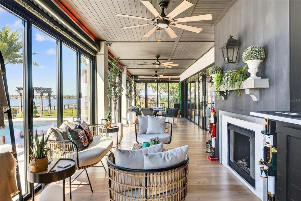 Dining room, Fireplace, Interior, Living room, Sun Room, Water, Wood Texture Flooring