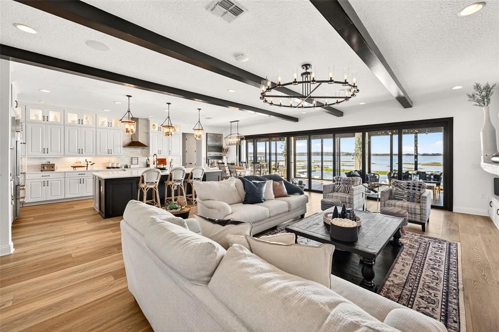 Chandelier, Interior, Kitchen, Living room, Pendant Lights, Recessed Lighting, Water, Wood Texture Flooring