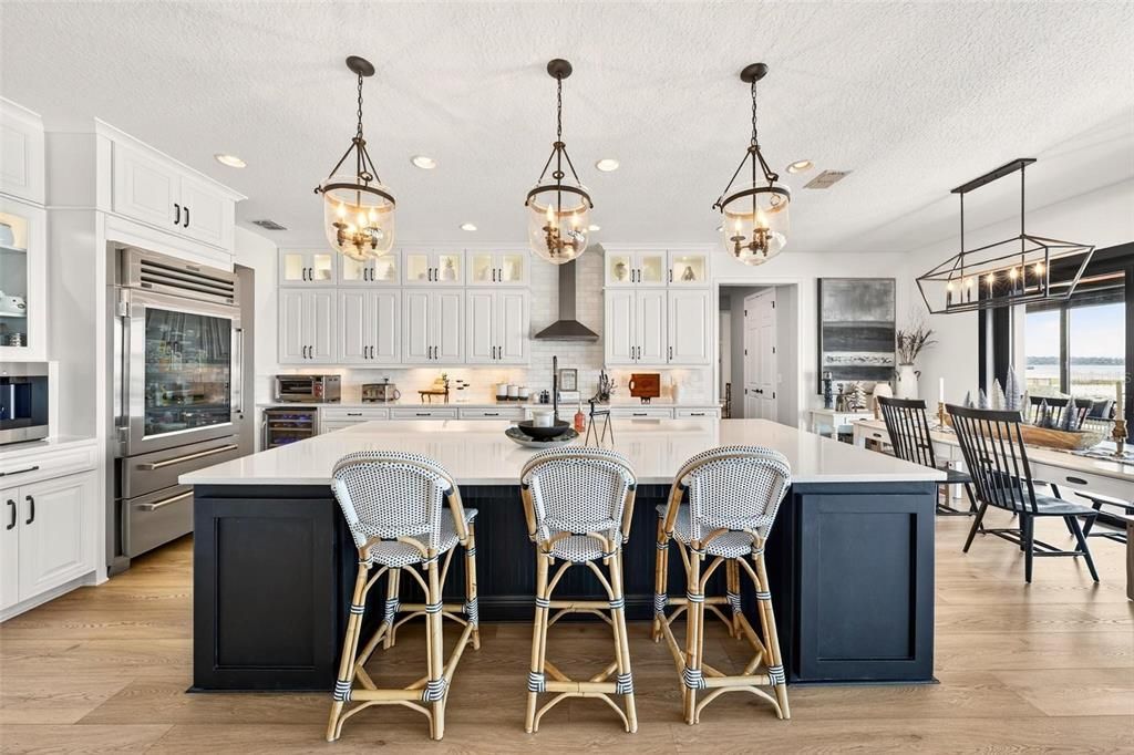 Chandelier, Interior, Kitchen, Pendant Lights, Recessed Lighting, Stainless Steel Appliances, Wood Texture Flooring