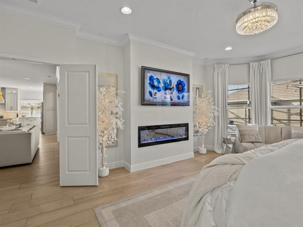 Bedroom, Fireplace, Interior, Recessed Lighting, Wood Texture Flooring