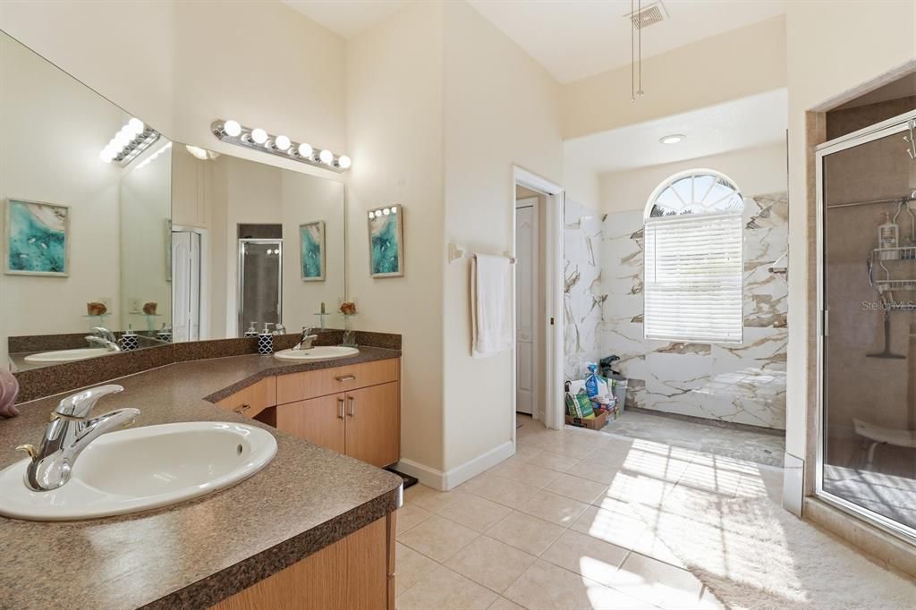 Bathroom, Dual Sink Vanities, Interior, Marble Walls, Recessed Lighting