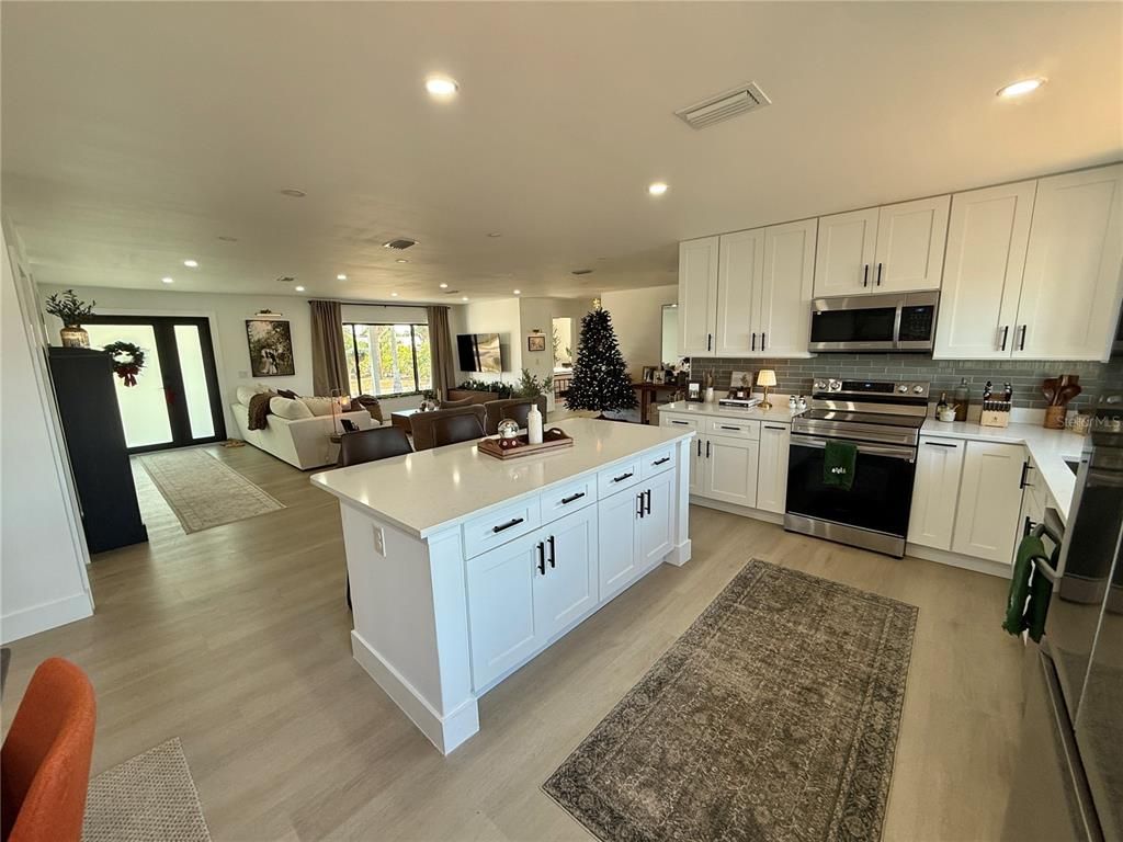 Interior, Kitchen, Living room, Recessed Lighting, Stainless Steel Appliances, Wood Texture Flooring