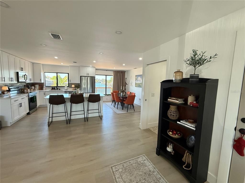 Dining room, Interior, Kitchen, Recessed Lighting, Stainless Steel Appliances, Wood Texture Flooring