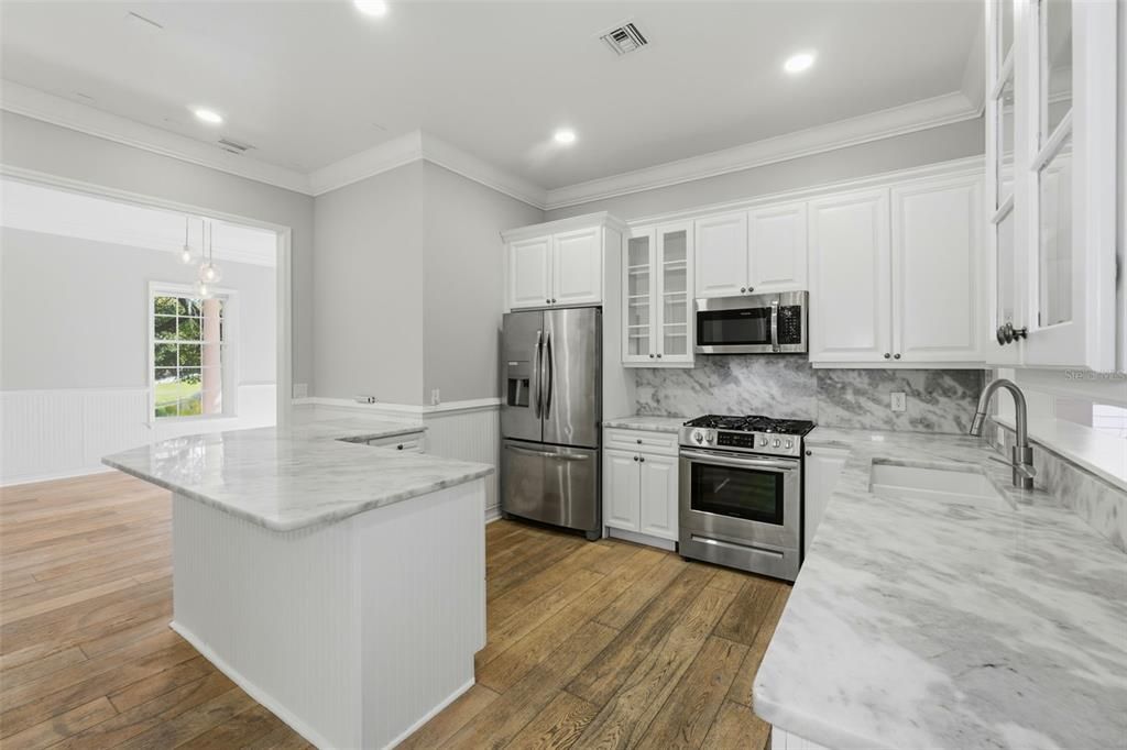Interior, Kitchen, Pendant Lights, Recessed Lighting, Stainless Steel Appliances, Wood Texture Flooring