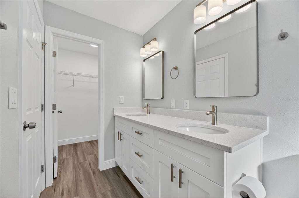 Bathroom, Dual Sink Vanities, Interior, Walk-in Closets, Wood Texture Flooring