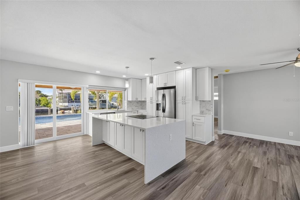 Interior, Kitchen, Pendant Lights, Recessed Lighting, Stainless Steel Appliances, Water, Wood Texture Flooring
