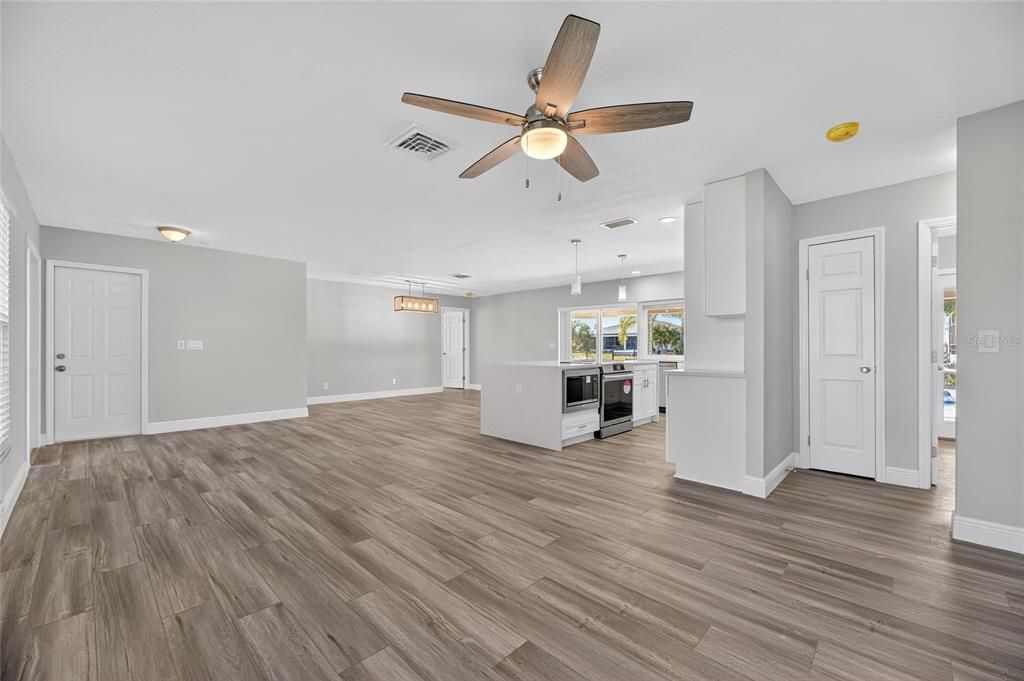 Empty room, Interior, Kitchen, Pendant Lights, Recessed Lighting, Wood Texture Flooring