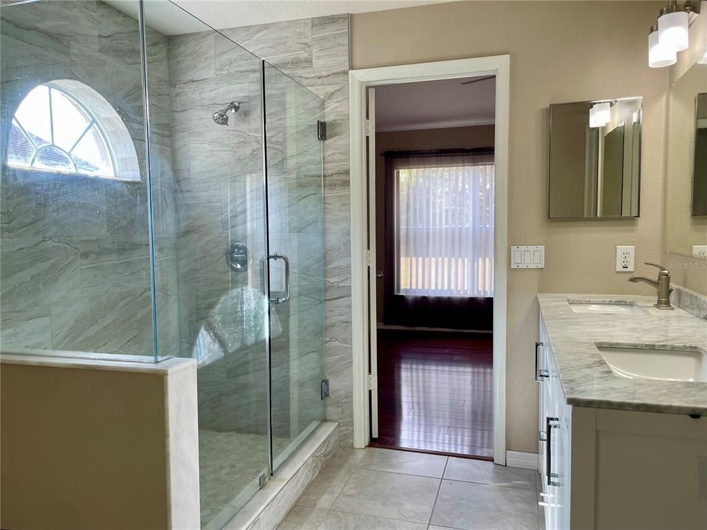 Bathroom, Dual Sink Vanities, Glass Shower, Interior, Marble Walls