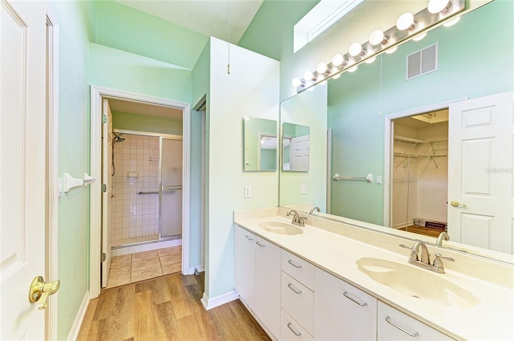 Bathroom, Dual Sink Vanities, Glass Shower, Interior, Wood Texture Flooring