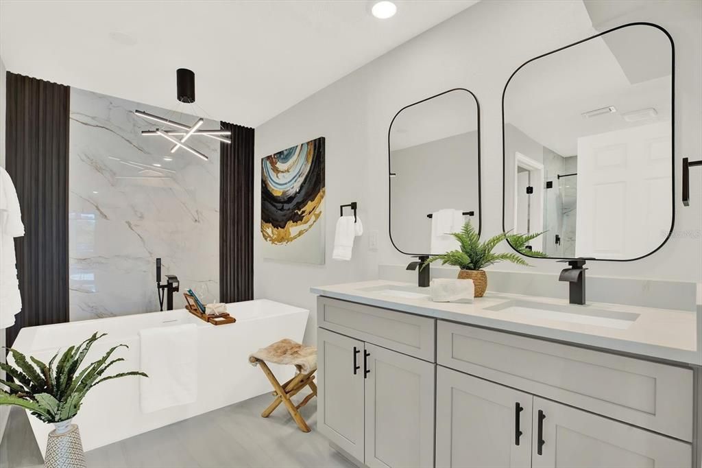 Bathroom, Dual Sink Vanities, Interior, Marble Walls, Recessed Lighting, Wood Texture Flooring