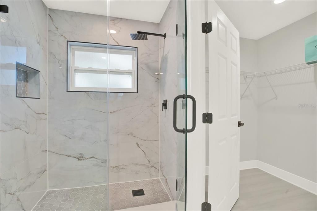 Bathroom, Glass Shower, Interior, Marble Walls, Recessed Lighting, Wood Texture Flooring