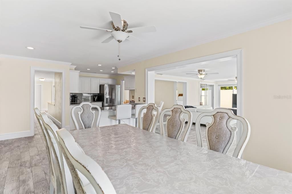 Dining room, Interior, Kitchen, Recessed Lighting, Stainless Steel Appliances, Wood Texture Flooring