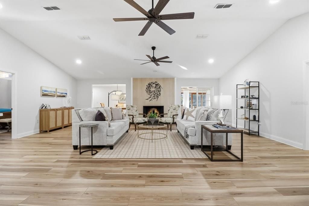 Fireplace, Interior, Living room, Recessed Lighting, Wood Texture Flooring