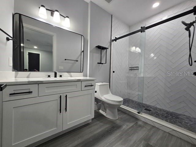 Bathroom, Glass Shower, Interior, Recessed Lighting, Wood Texture Flooring