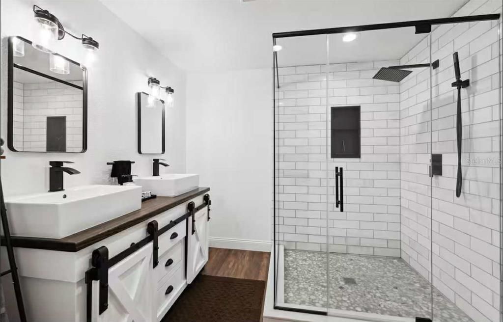 Bathroom, Dual Sink Vanities, Glass Shower, Interior, Recessed Lighting, Wood Texture Flooring