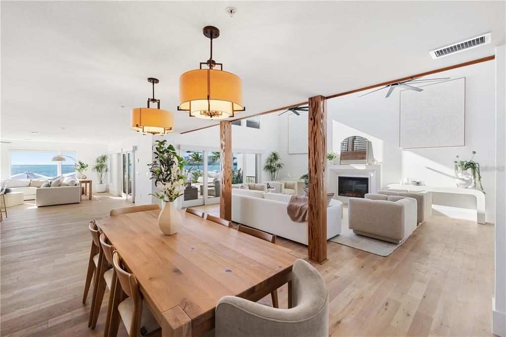 Dining room, Fireplace, Interior, Living room, Pendant Lights, Water, Wood Texture Flooring