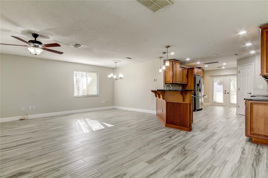 Chandelier, Empty room, Interior, Kitchen, Pendant Lights, Recessed Lighting, Wood Texture Flooring