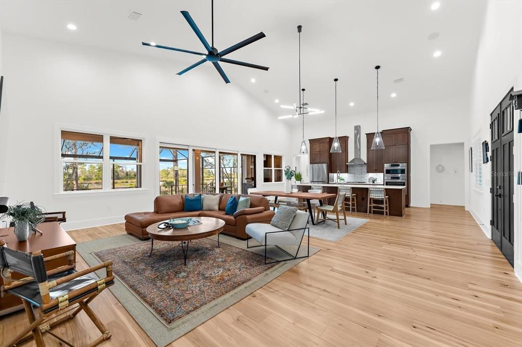 Dining room, Interior, Kitchen, Living room, Pendant Lights, Recessed Lighting, Stainless Steel Appliances, Wood Texture Flooring