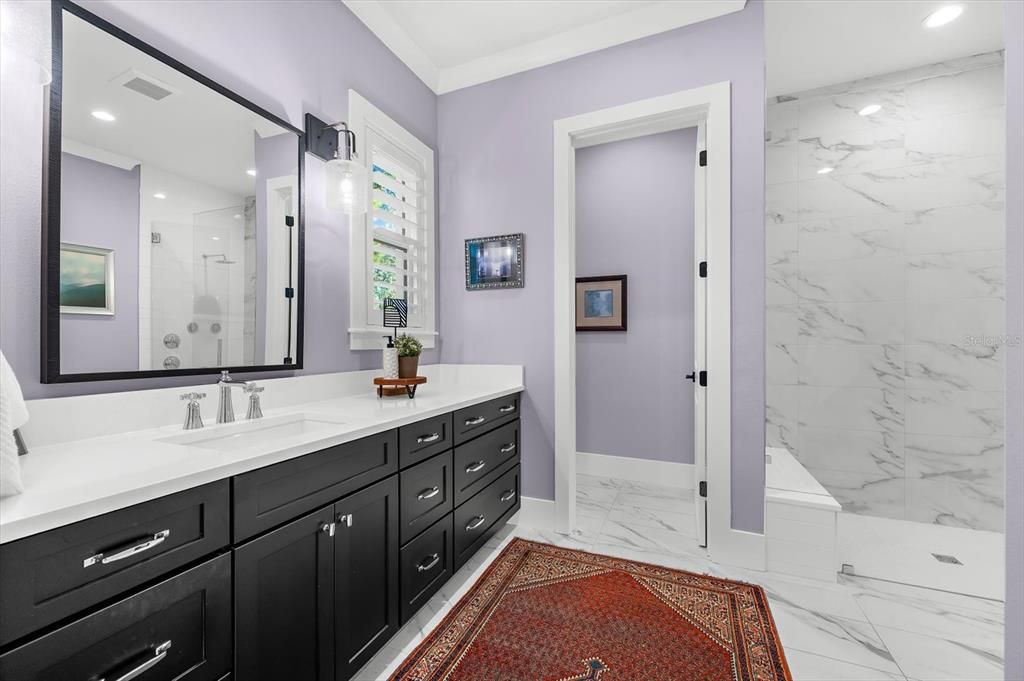 Bathroom, Dual Sink Vanities, Glass Shower, Interior, Marble, Marble Walls, Recessed Lighting