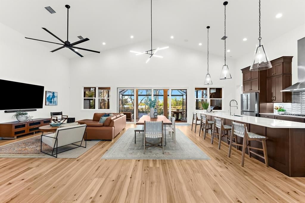 Dining room, Interior, Kitchen, Living room, Pendant Lights, Recessed Lighting, Stainless Steel Appliances, Wood Texture Flooring