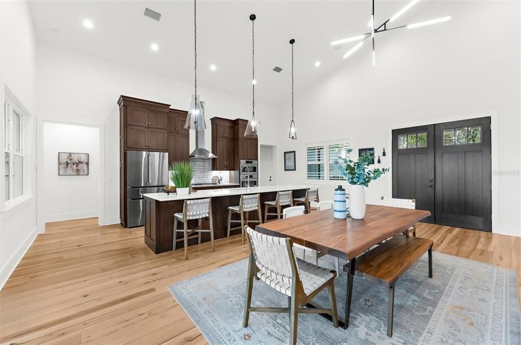 Dining room, Interior, Kitchen, Pendant Lights, Recessed Lighting, Stainless Steel Appliances, Wood Texture Flooring