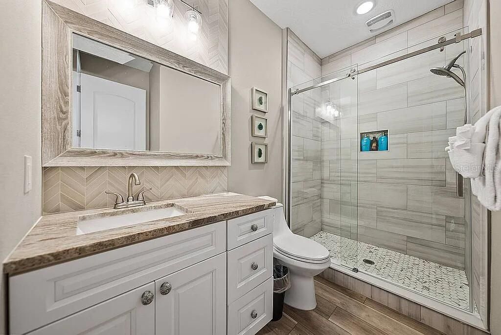 Bathroom, Glass Shower, Interior, Recessed Lighting, Wood Texture Flooring