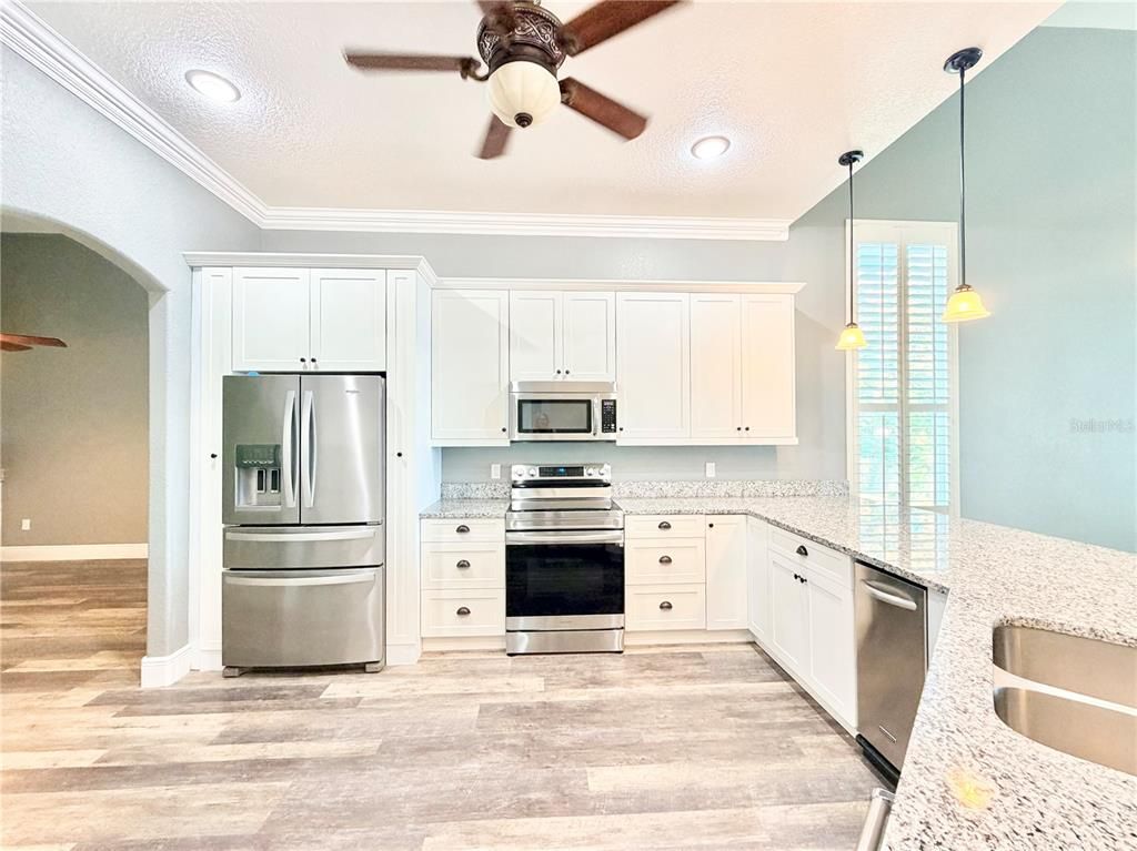 Interior, Kitchen, Pendant Lights, Recessed Lighting, Stainless Steel Appliances, Wood Texture Flooring