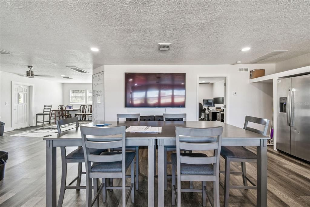 Dining room, Interior, Kitchen, Recessed Lighting, Stainless Steel Appliances, Wood Texture Flooring