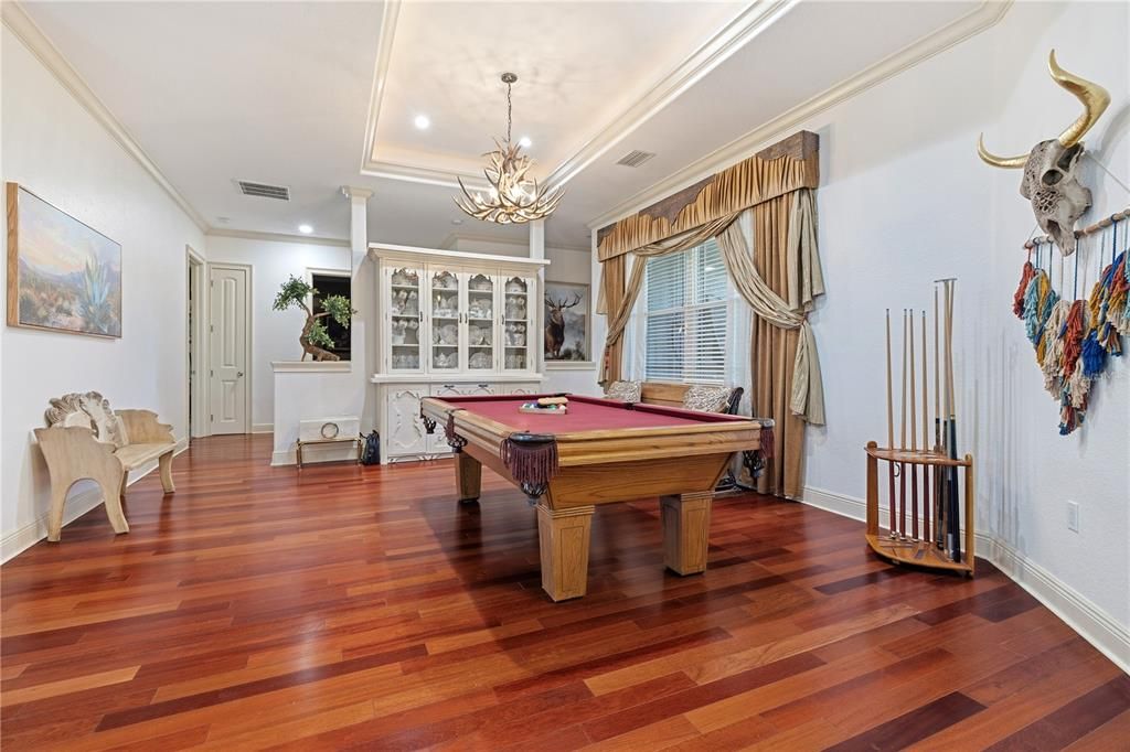 Billiard Table, Chandelier, Game Room, Interior, Pendant Lights, Recessed Lighting, Wood Texture Flooring