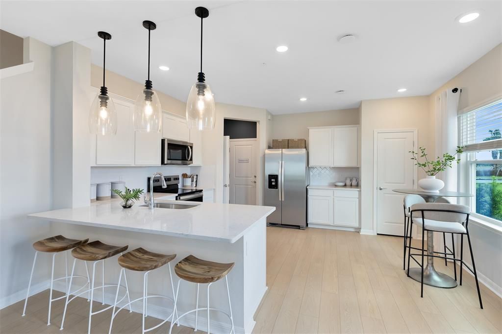 Interior, Kitchen, Pendant Lights, Recessed Lighting, Stainless Steel Appliances, Wood Texture Flooring