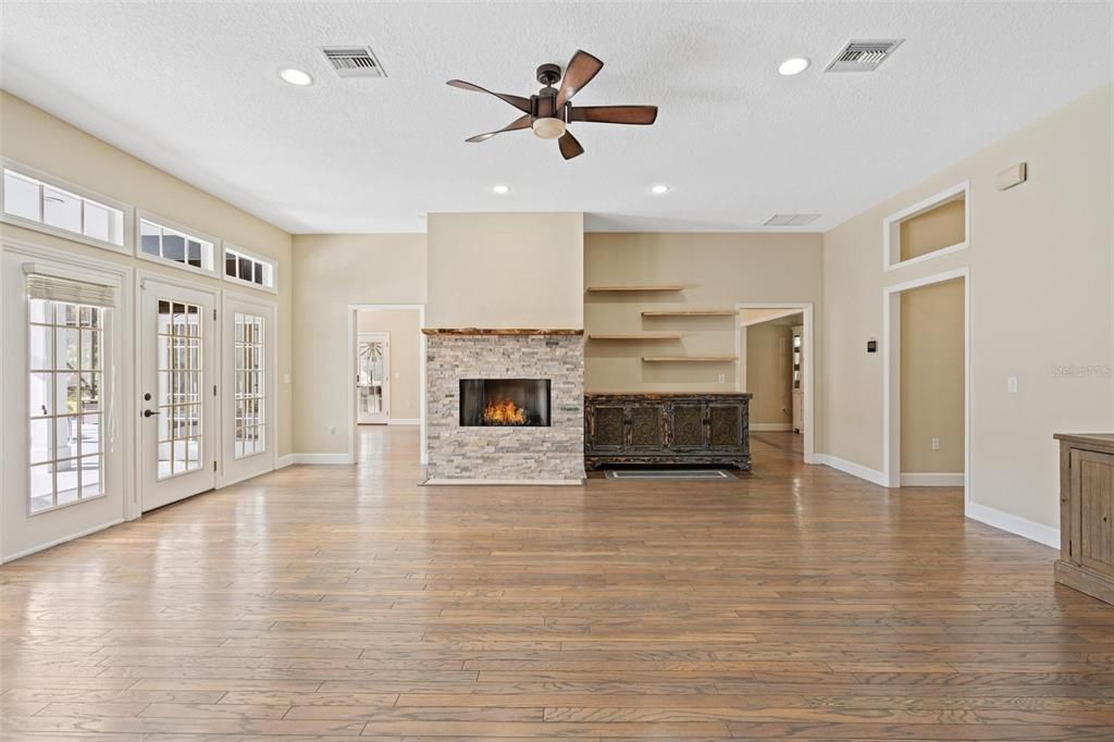 Empty room, Fireplace, Interior, Recessed Lighting, Wood Texture Flooring