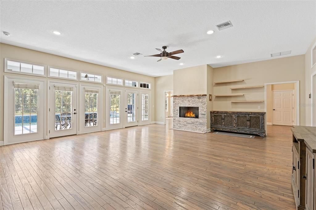 Empty room, Fireplace, Interior, Recessed Lighting, Wood Texture Flooring