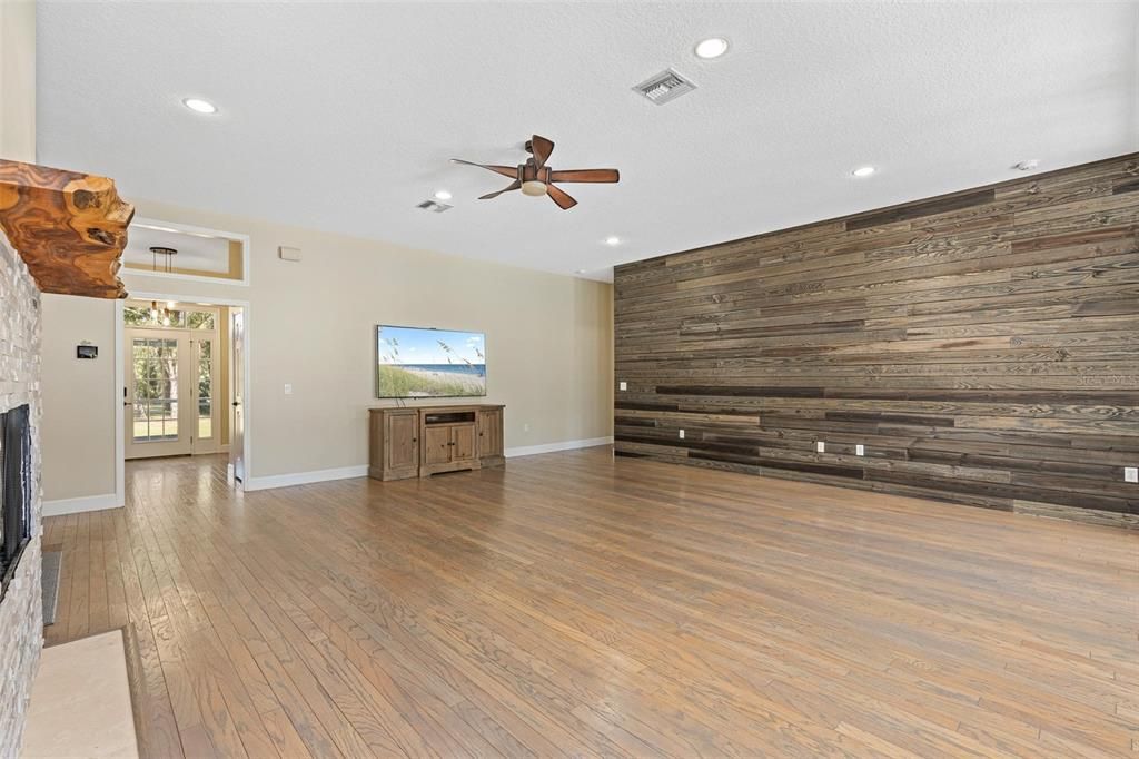 Empty room, Fireplace, Interior, Pendant Lights, Recessed Lighting, Wood Texture Flooring, Wooden Walls