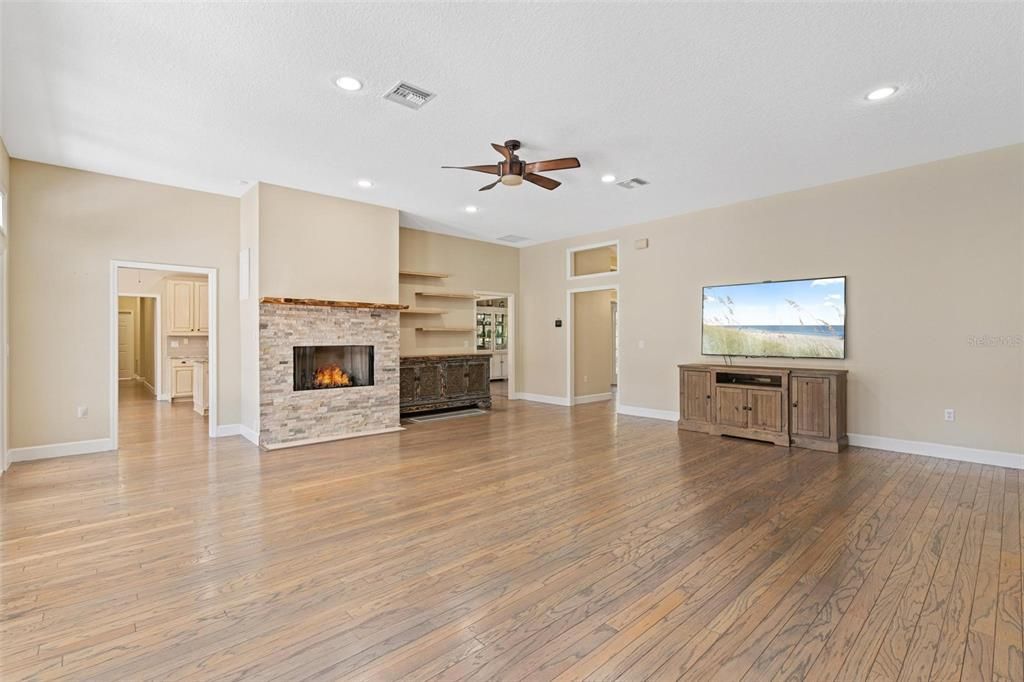Empty room, Fireplace, Interior, Recessed Lighting, Wood Texture Flooring