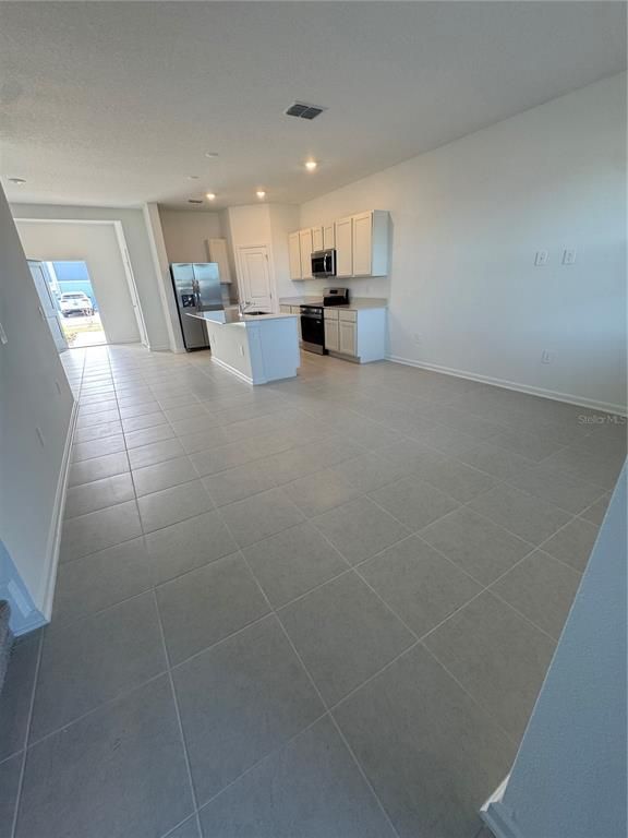 Empty room, Interior, Kitchen, Recessed Lighting, Stainless Steel Appliances