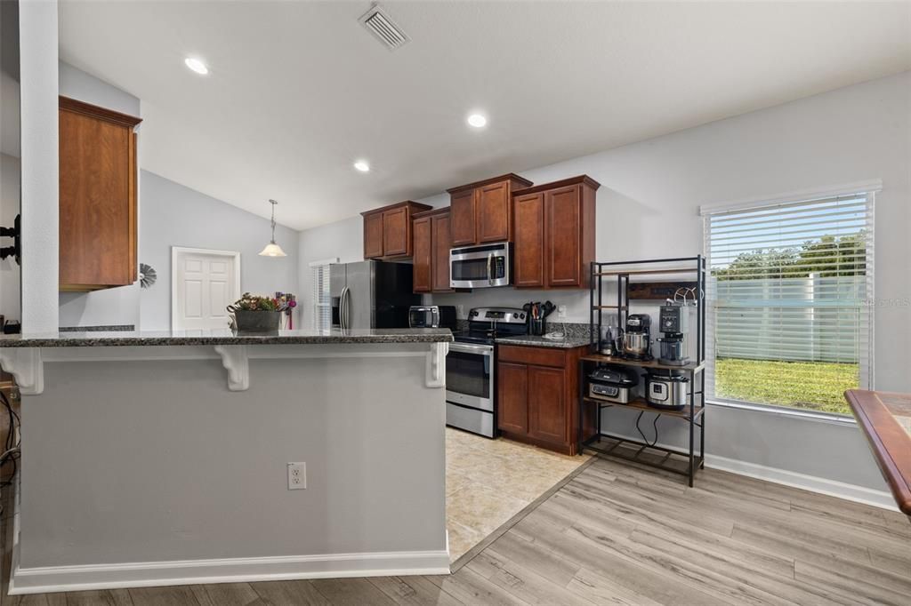 Interior, Kitchen, Pendant Lights, Recessed Lighting, Stainless Steel Appliances, Wood Texture Flooring