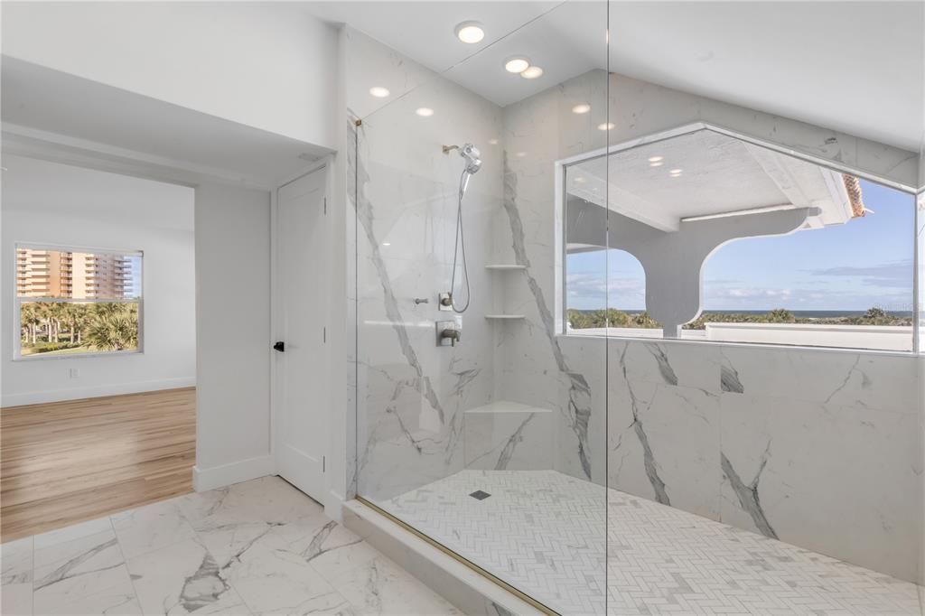 Bathroom, Glass Shower, Interior, Marble, Marble Walls, Recessed Lighting, Wood Texture Flooring