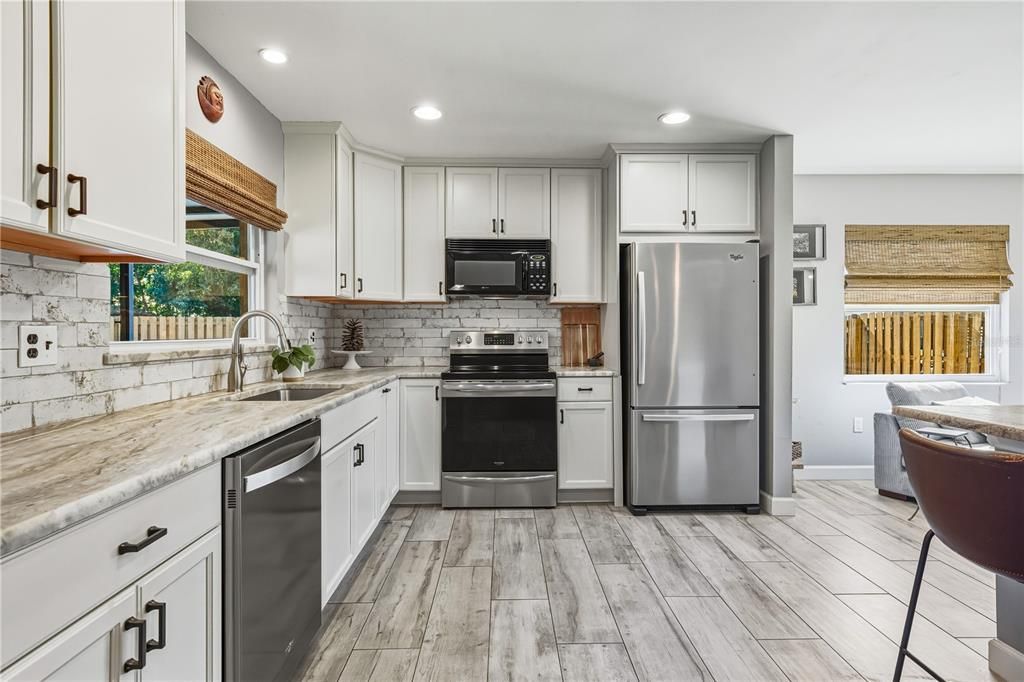 Interior, Kitchen, Recessed Lighting, Stainless Steel Appliances, Wood Texture Flooring