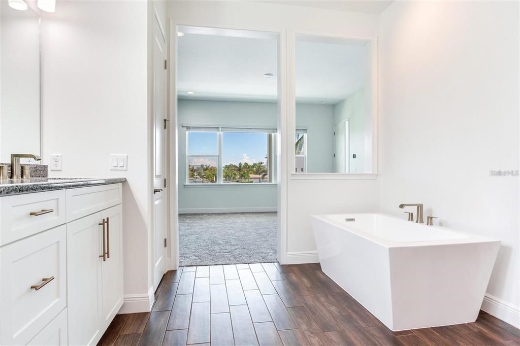 Bathroom, Free Standing Baths, Interior, Recessed Lighting, Wood Texture Flooring