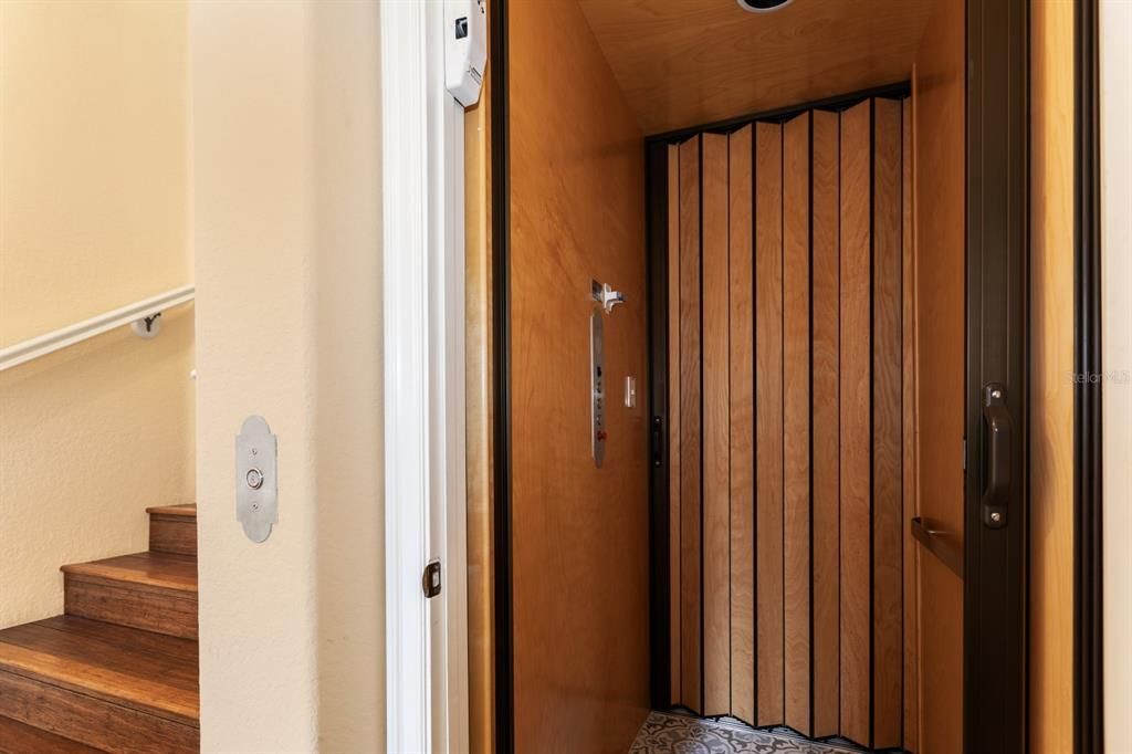 Elevator, Interior, Recessed Lighting, Wooden Ceilings, Wooden Walls