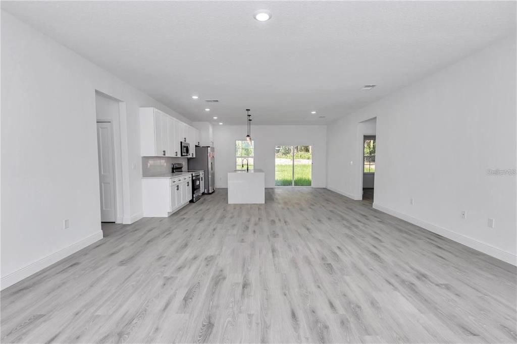 Empty room, Interior, Kitchen, Pendant Lights, Recessed Lighting, Wood Texture Flooring