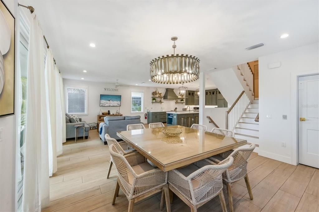 Chandelier, Dining room, Interior, Kitchen, Living room, Recessed Lighting, Wood Texture Flooring