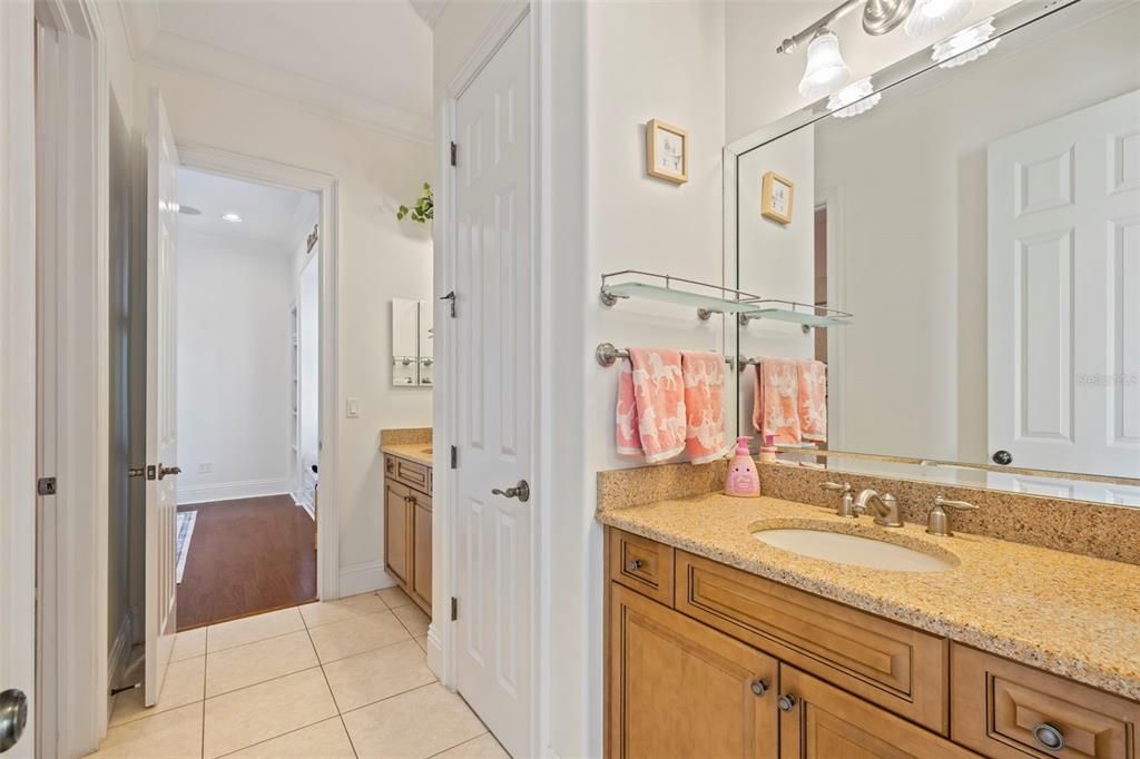 Bathroom, Dual Sink Vanities, Interior, Recessed Lighting, Wood Texture Flooring