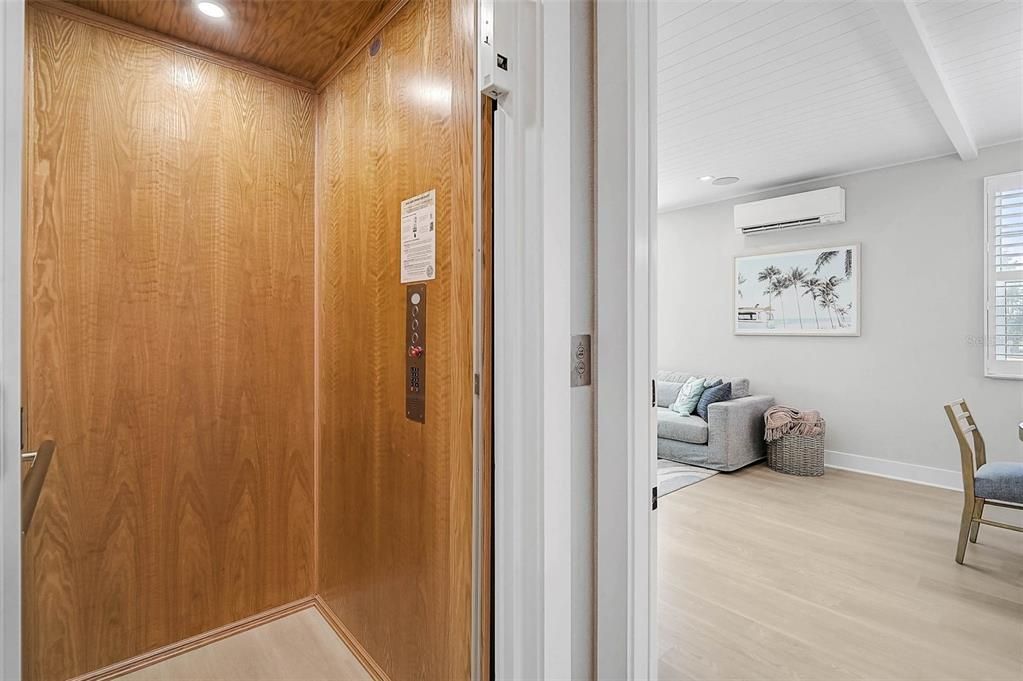 Elevator, Interior, Recessed Lighting, Wood Texture Flooring, Wooden Walls
