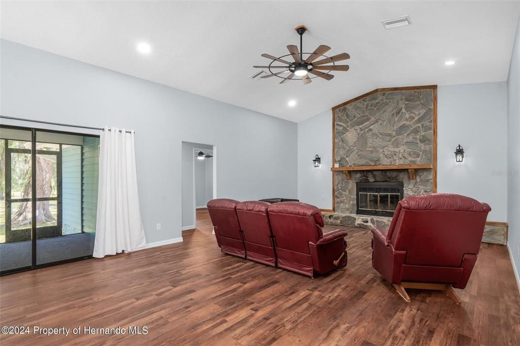 Fireplace, Interior, Living room, Recessed Lighting, Wood Texture Flooring